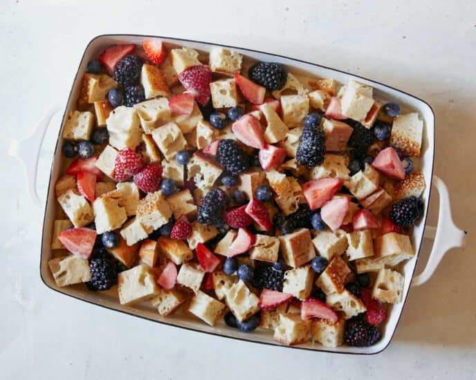 Bread pudding with custard poured over it.