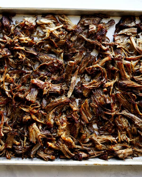 Carnitas on a baking sheet baked.