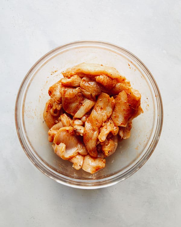 Chicken marinating for chicken fajitas.