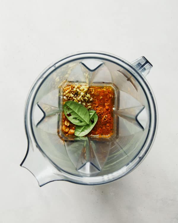 Chicken satay ingredients in a blender.