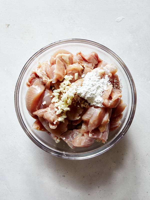 Marinating chicken for honey garlic chicken recipe.
