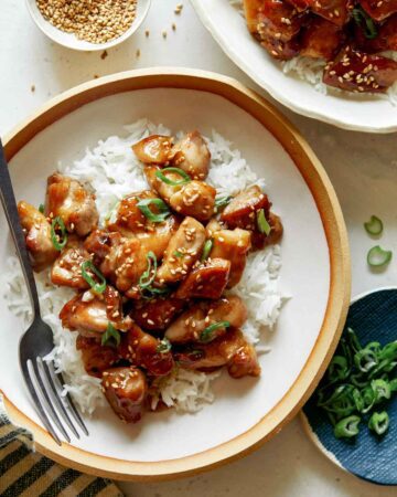 Honey garlic chicken dinner recipe in two bowls ready to be eaten.