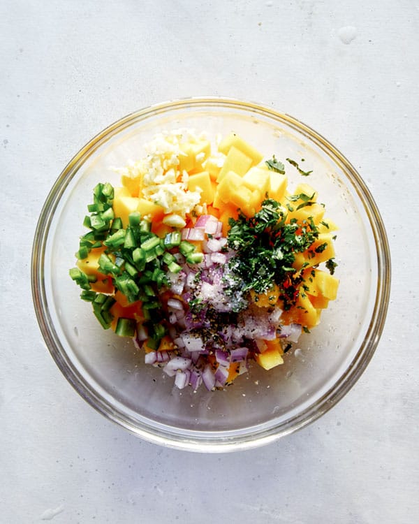 Mango salsa ingredients in a bowl.