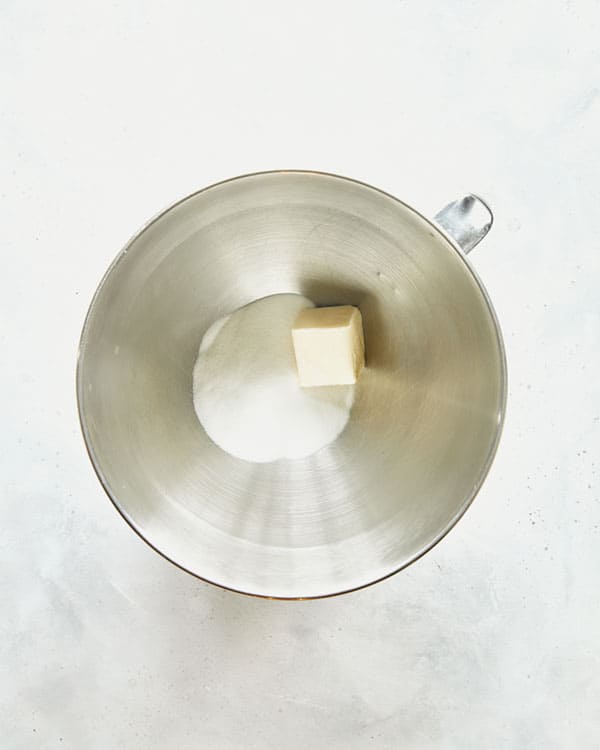 Butter and sugar in the bowl of a stand mixer.
