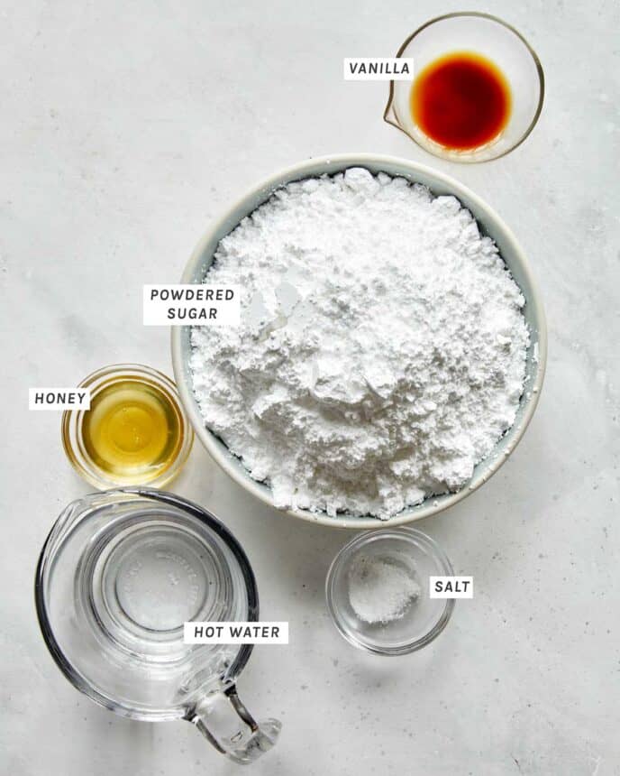 Ingredients to make a vanilla glaze for old fashioned donuts. 