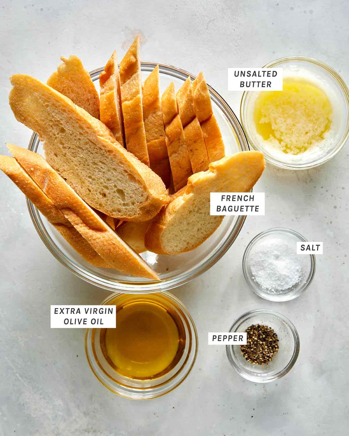 Bruschetta baguette ingredients all laid out.