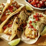 Baja fish tacos recipe with beer on the side.