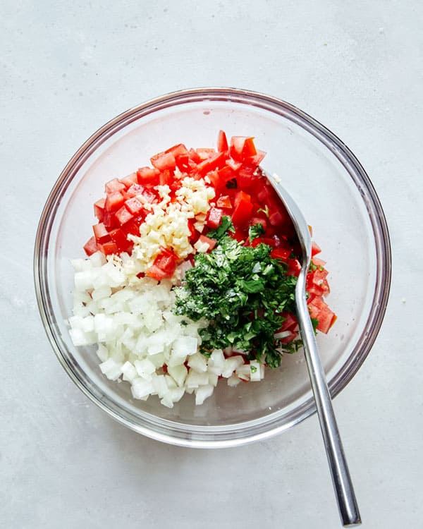 Pico de gallo ingredients in a bowl. 