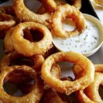 Beer battered onion rings recipe with ranch dressing.