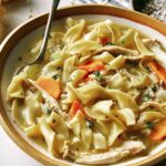 Chicken noodle soup recipe in a bowl.