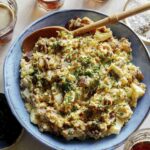 Creamy potato salad with beers on the side.