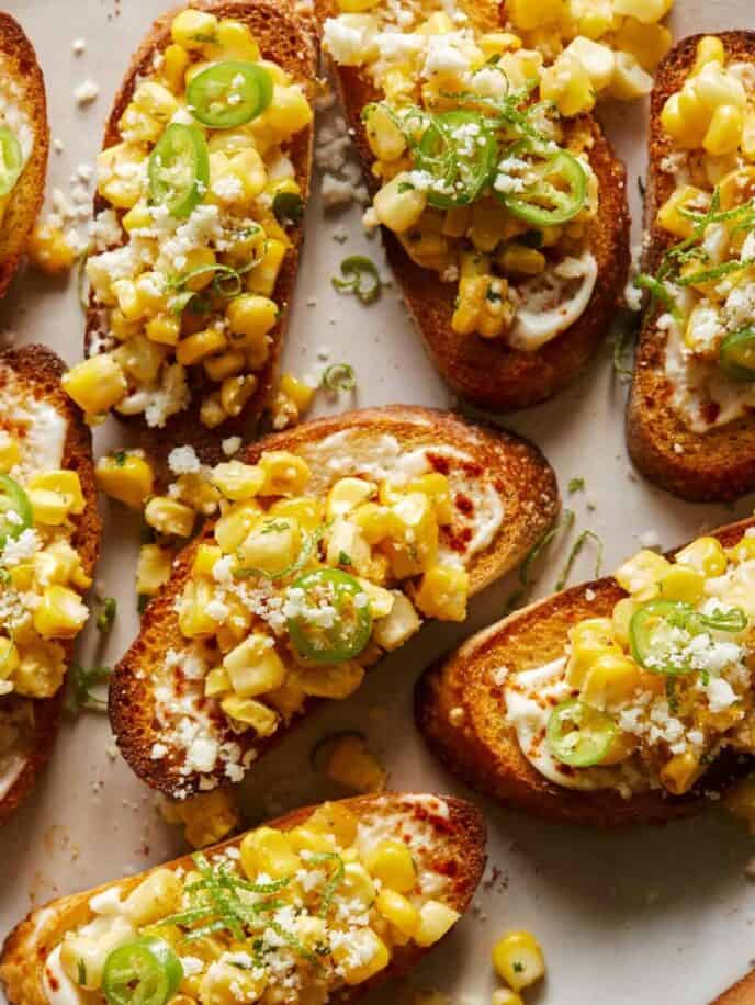 A close up of elote bruschetta.