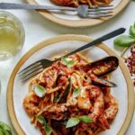 Frutti Di Mare served onto two plates.