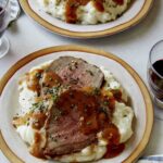 Roast beef recipe with red wine and mashed potatoes.