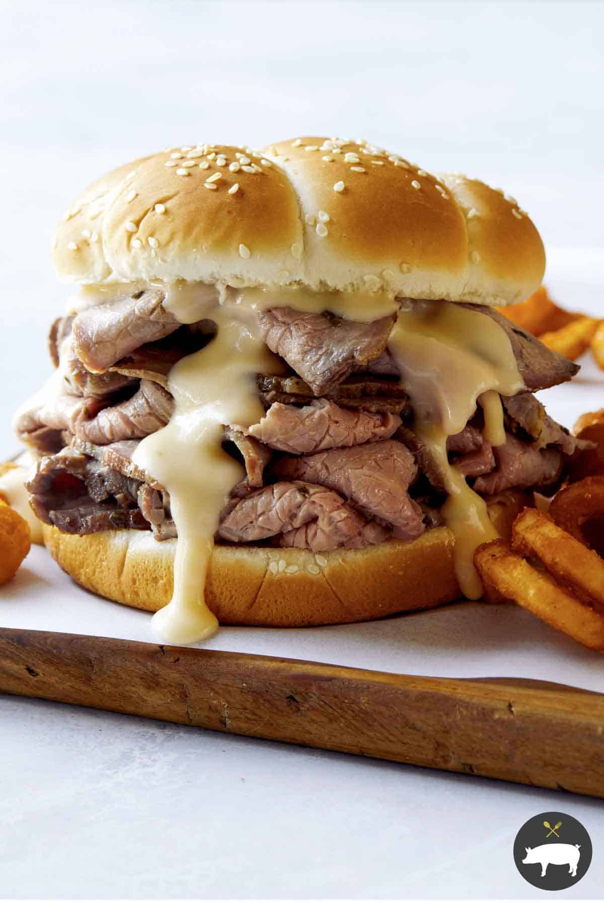 Roast beef sandwich recipe with fries on the side.