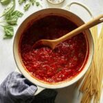 Arrabiata sauce in a stock pot.