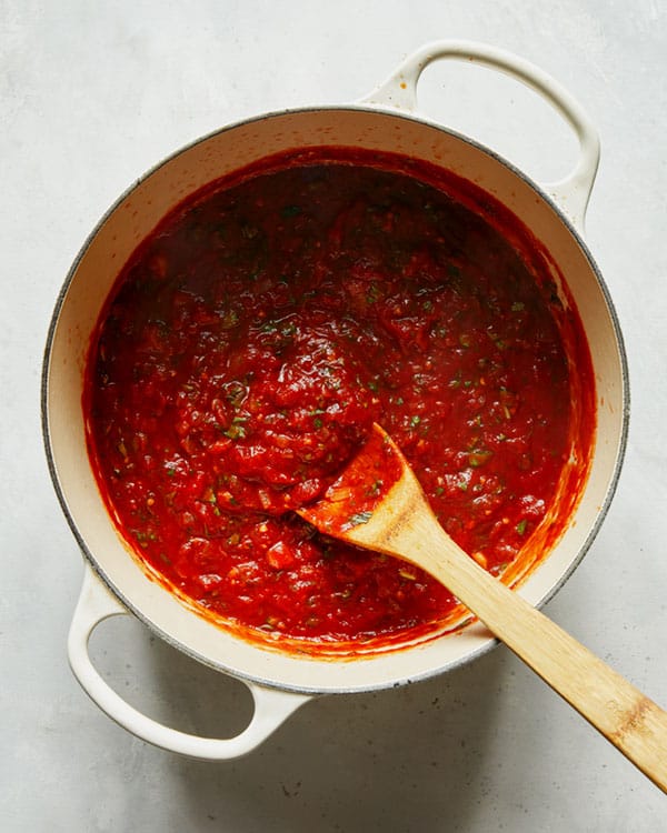 Finished arrabiata sauce cooling in a stock pot.