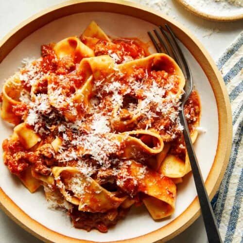 Bolognese sauce recipe in a bowl with pasta.