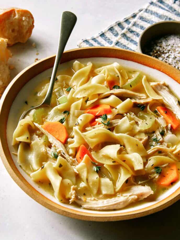 Chicken noodle soup recipe in a bowl.