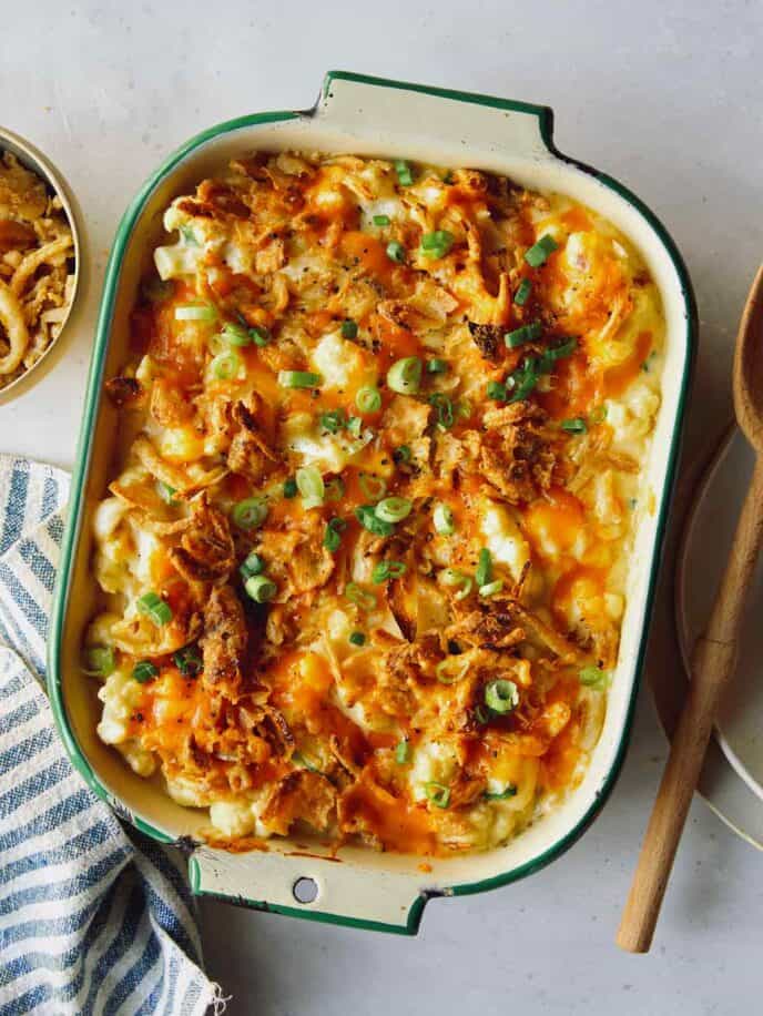 Creamy cauliflower baked recipe in a casserole dish.