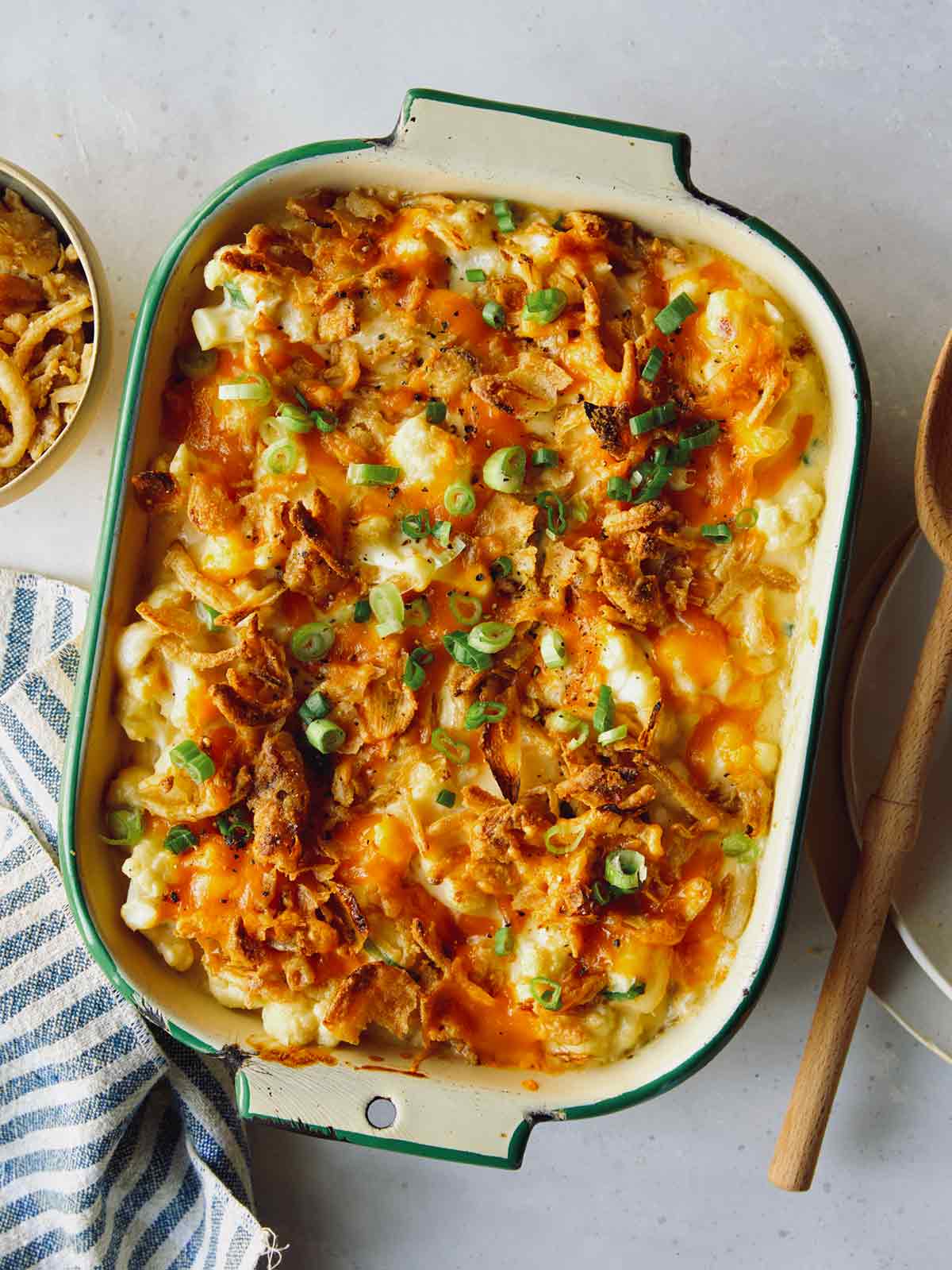 Creamy cauliflower baked recipe in a casserole dish.