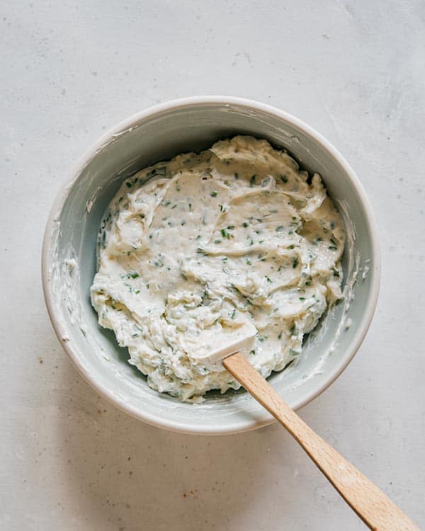 Garlic bread spread mixed together in a bowl.