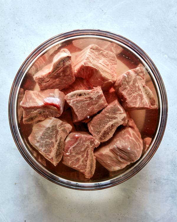 Short ribs for galbi jjim soaking in water.