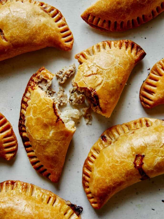 Pork pastie recipe with one torn open. 