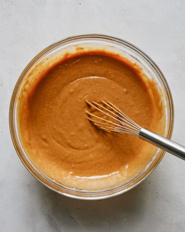 Pumpkin bars batter in a glass bowl.
