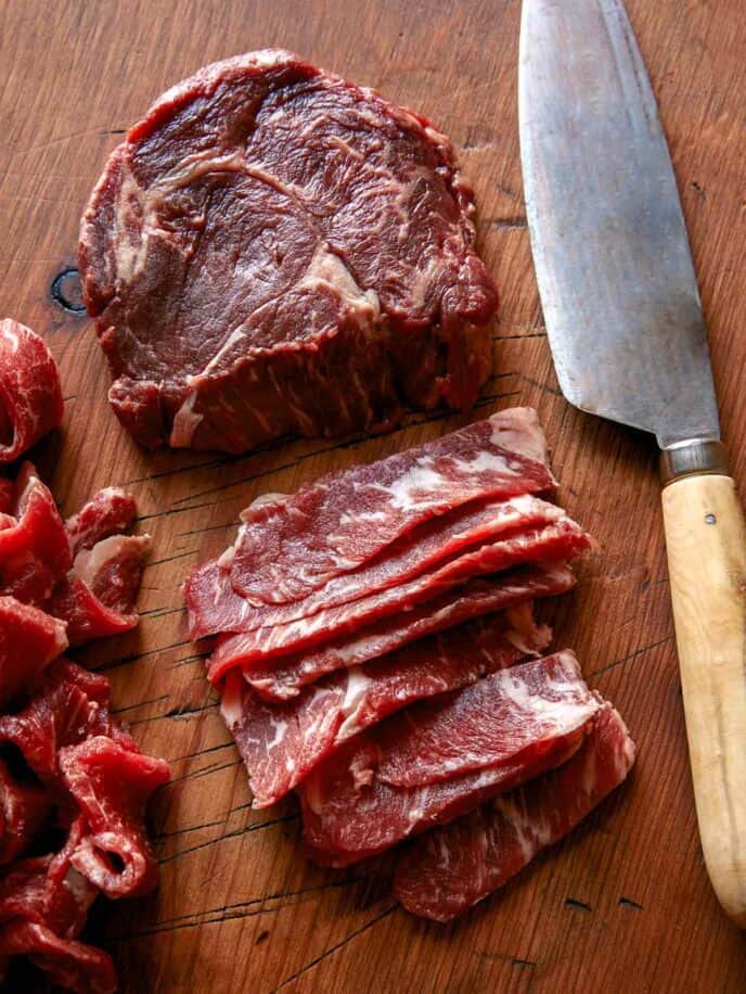 Wagyu beef being sliced for Philly Cheesesteak. 