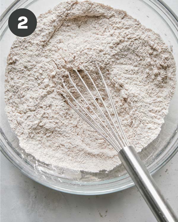 Dry ingredients in a bowl for pumpkin bars recipe.
