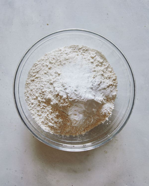 Dry ingredients in a bowl for M&M cookies.