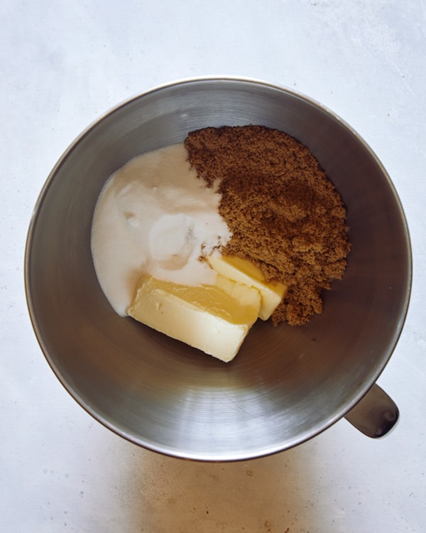 Butter and sugar in a mixing bowl to be creamed together.