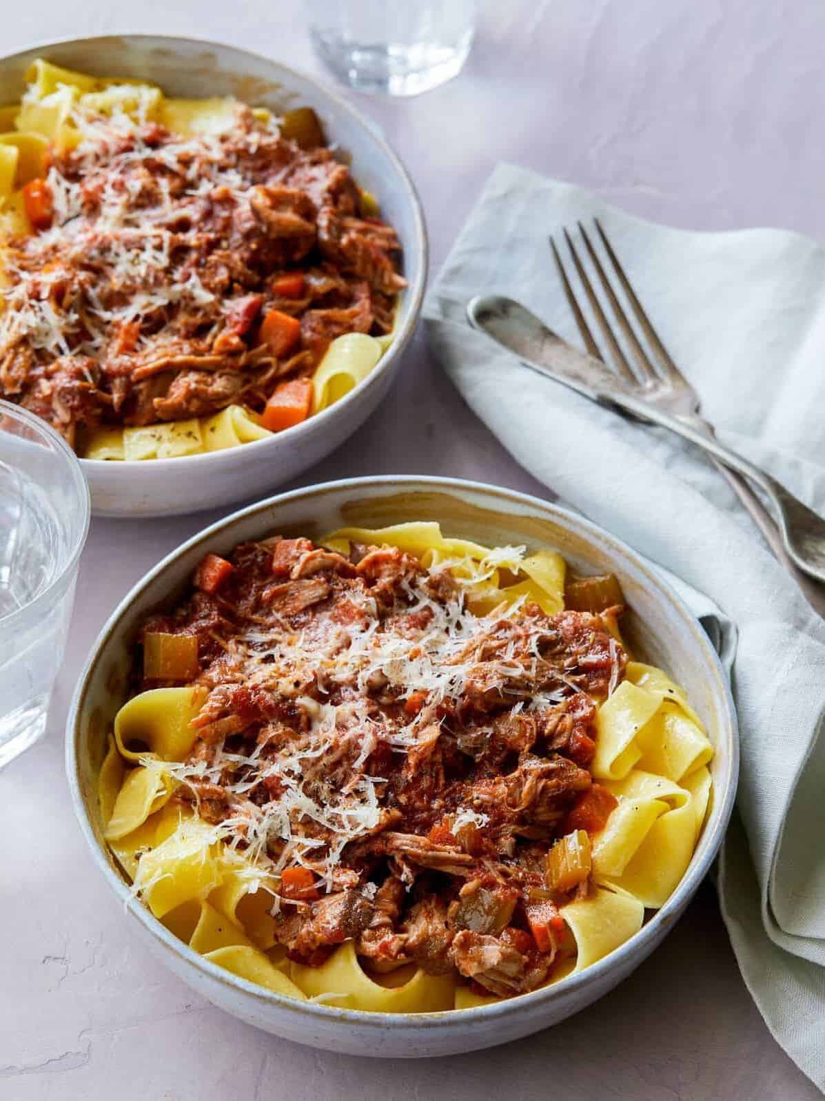 Bowls of braised pork ragu pappardelle, a Christmas Dinner ideas. 