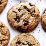 Brown Butter chocolate chip cookies laid out on a kitchen counter.