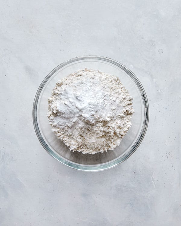 Flour in a glass bowl. 
