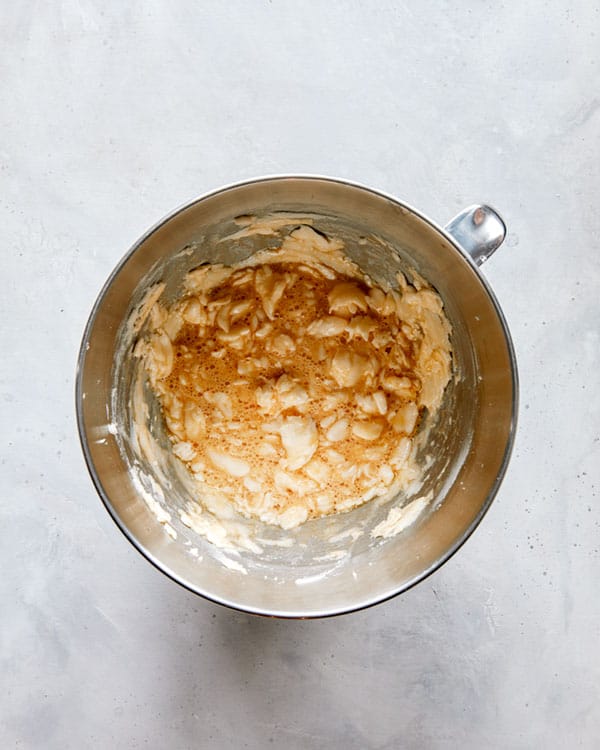 Snickerdoodle cookie dough being mixed in a bowl.