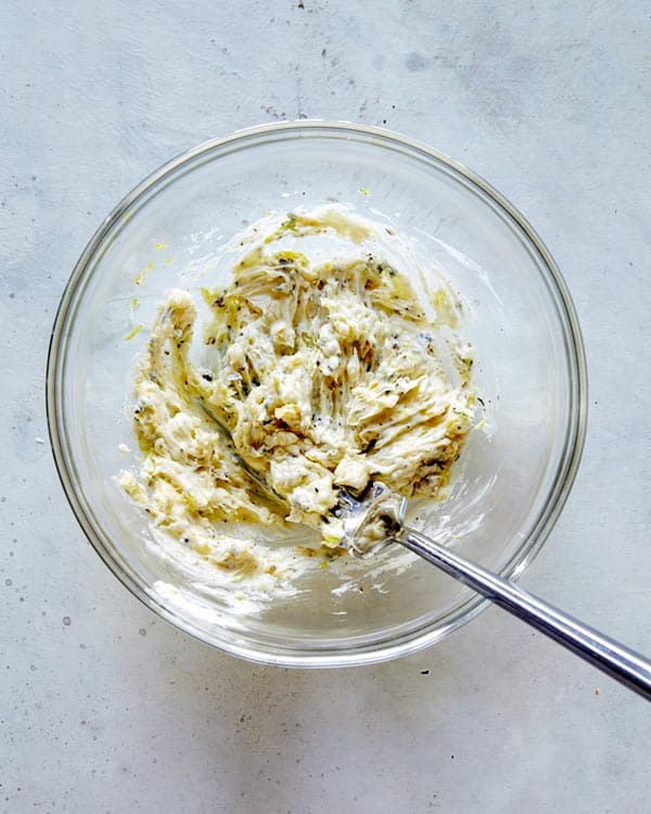 Butter mixed in a bowl for Spatchcock chicken.