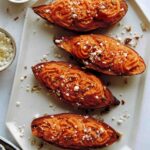 Twice baked sweet potatoes prepared and put on a platter.