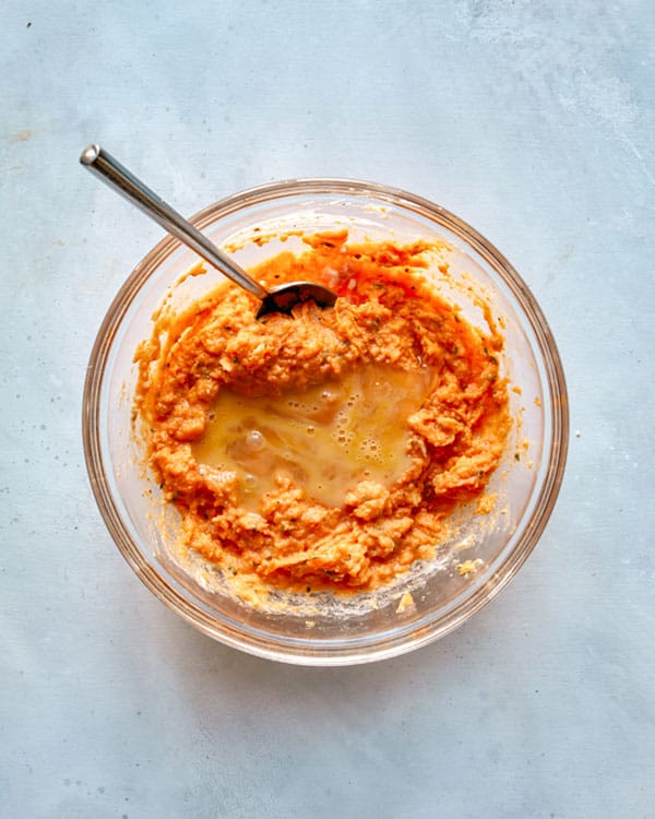Sweet potato filling with egg in a bowl.