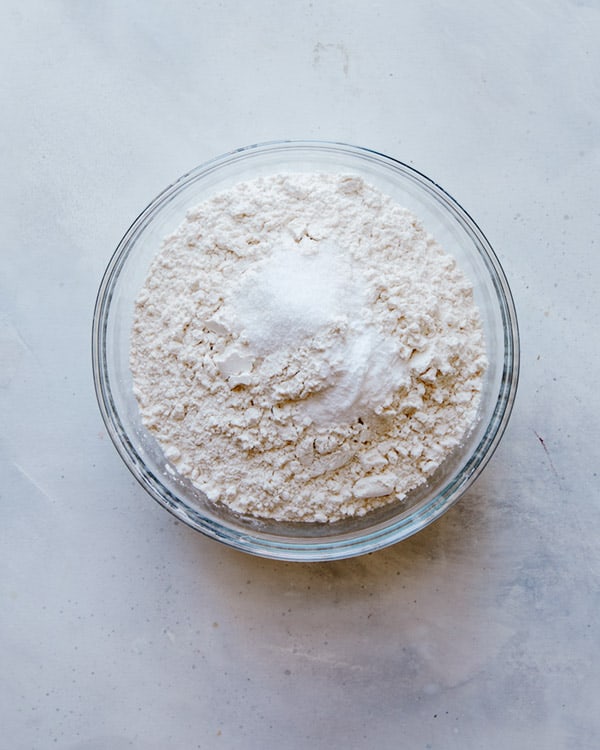 Dry ingredients in a bowl for chocolate chip cookies.