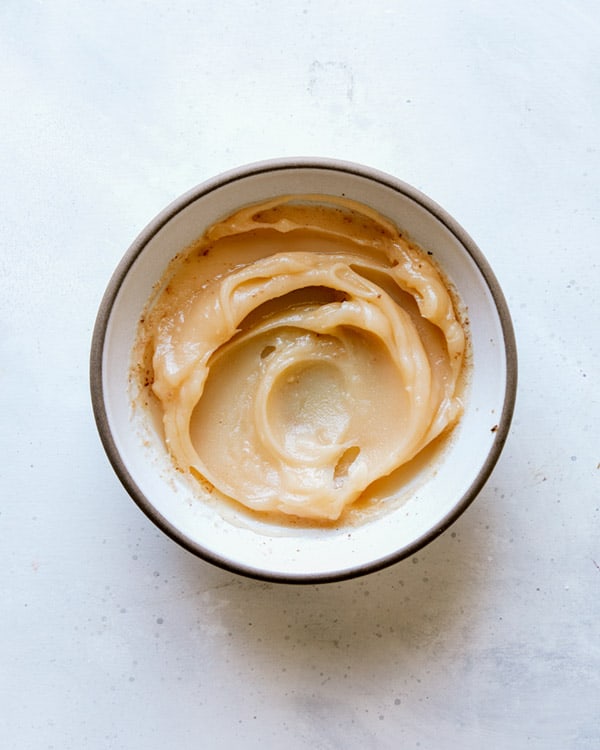 Brown butter cooled in a bowl.