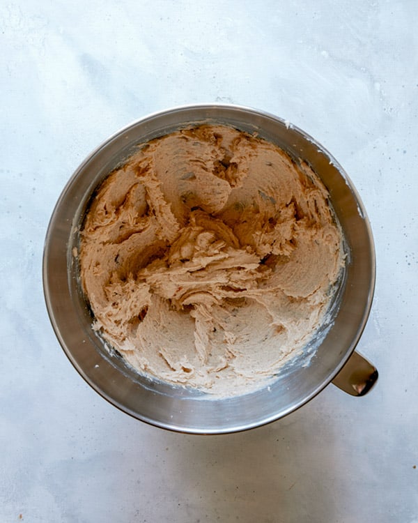The process of mixing cookie dough.
