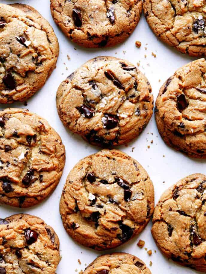 Brown Butter chocolate chip cookies laid out on a kitchen counter.