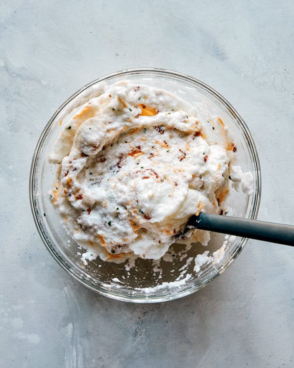 Egg whites for egg clouds in a bowl.