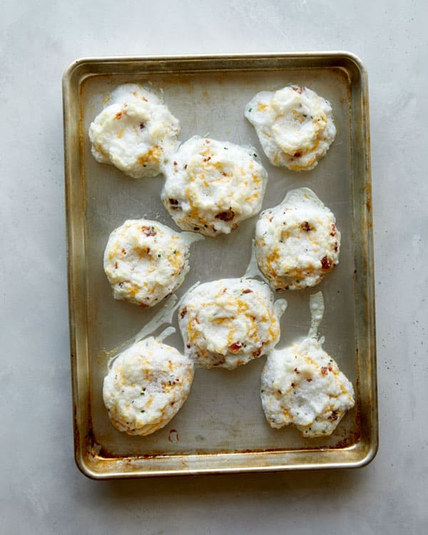 Baked egg clouds on a greased backing sheet.