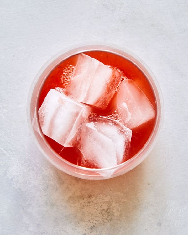 Cocktail glass with shandy ingredients. 