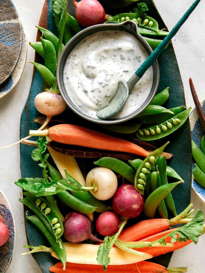 Ranch dressing served with vegetables. 