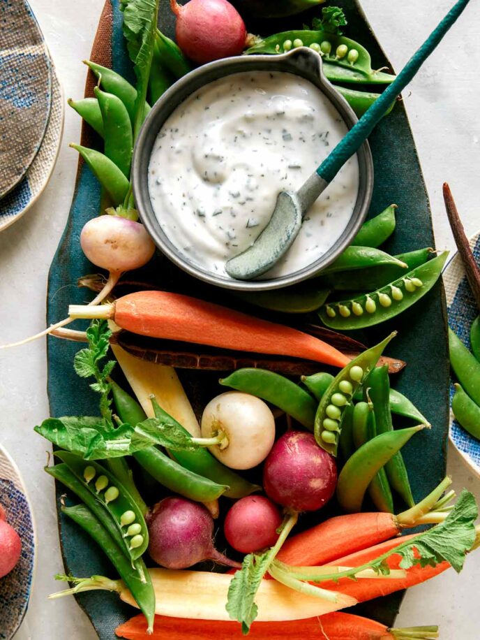 Ranch dressing served with vegetables.