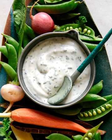 Easy homemade ranch dressing served with veggies.